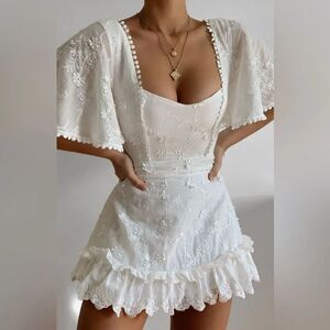Revolve Showpo. FANCY A SPRITZ White Embroidered Flutter Sleeve Mini Dress